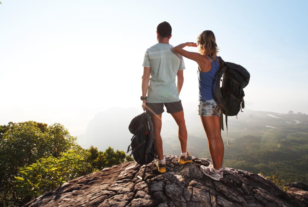 couple-hiking-and-enjoying-view