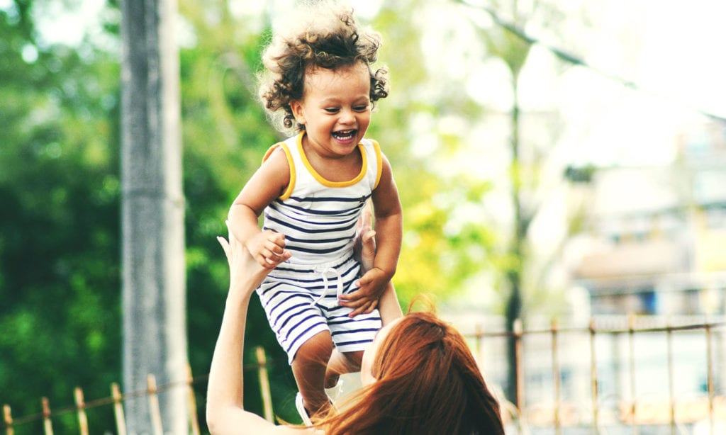 mom playing with toddler